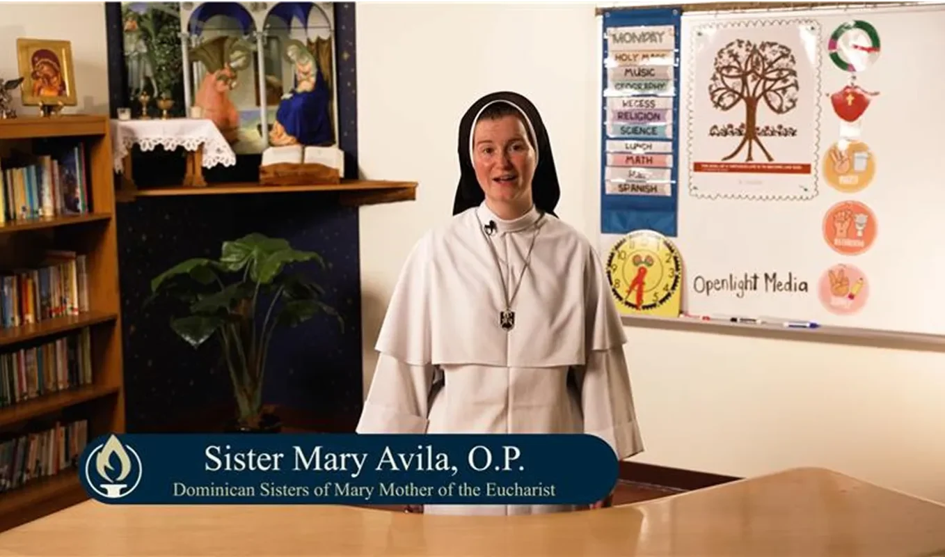 A dominican Sister in a classroom with Education in Virtue materials speaking to a camera.