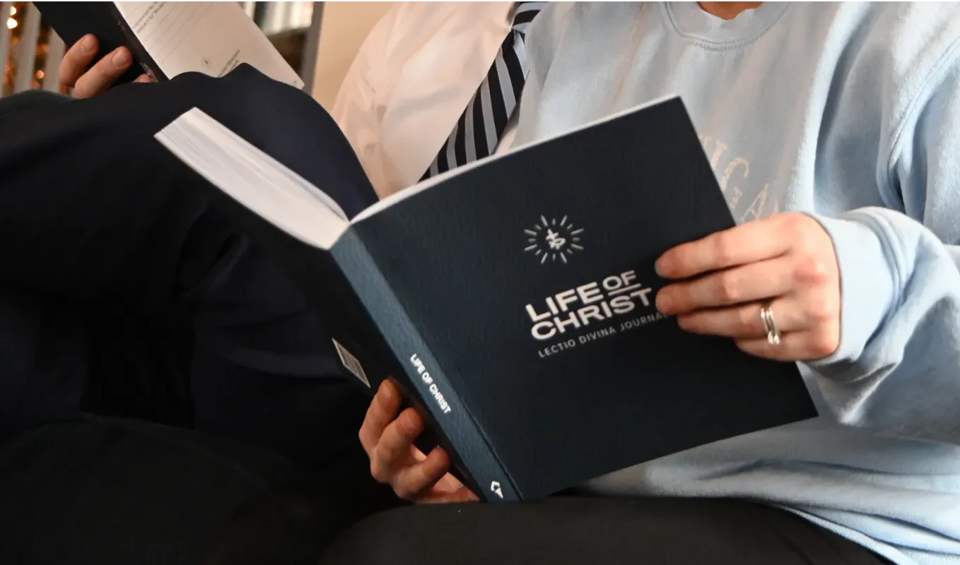 someone-reading-the-lectio-divina-life-of-christ-journal-by-Sister-John-Dominic-OP_compressed-1358x800